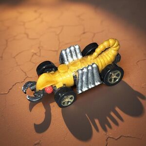 Vintage 1985 Hot Wheels Evil Weevil Gold Scorpion Die Cast Metal Plastic Car